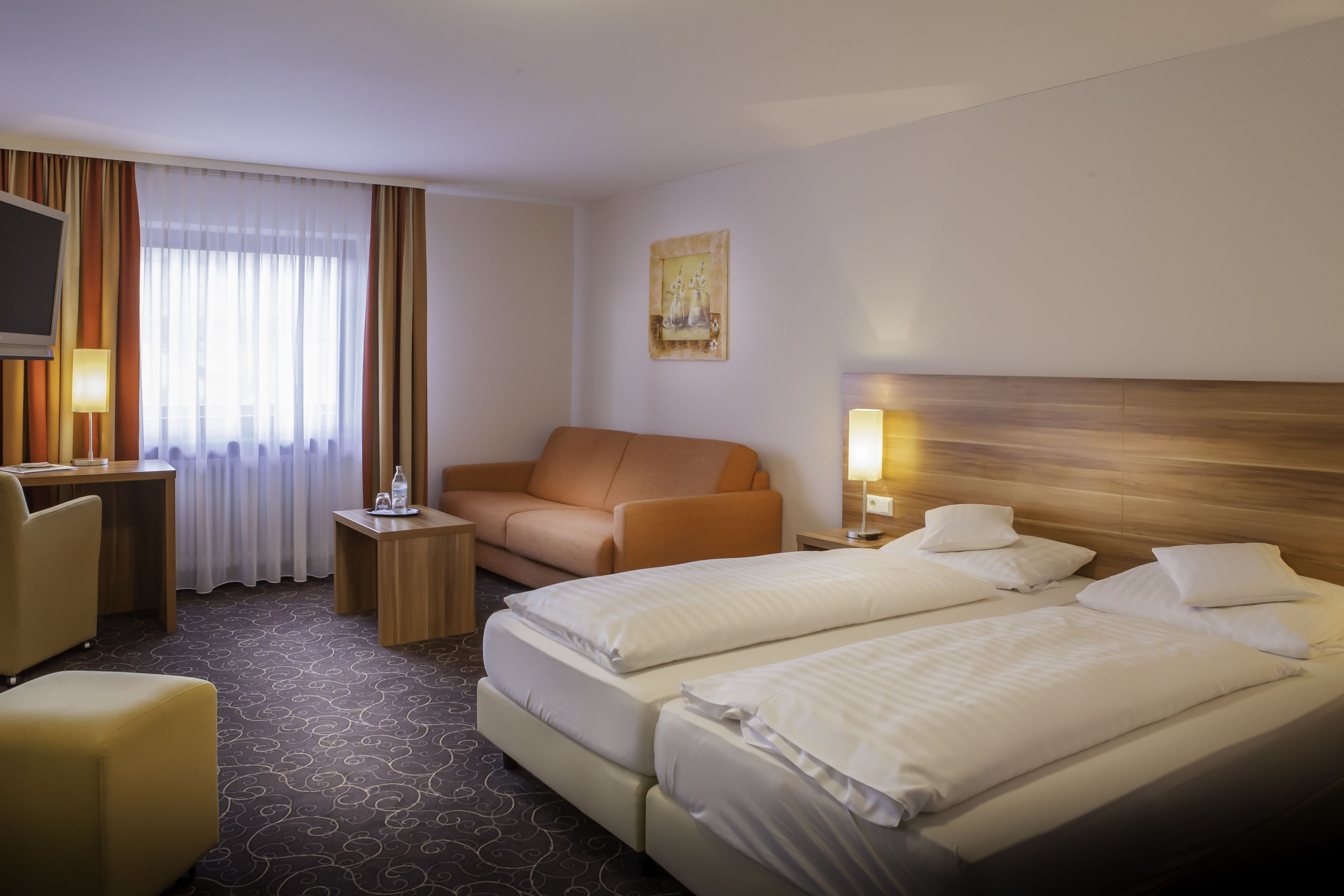 deluxe room | desk, laptop workspace, blackout curtains, cots/infant beds