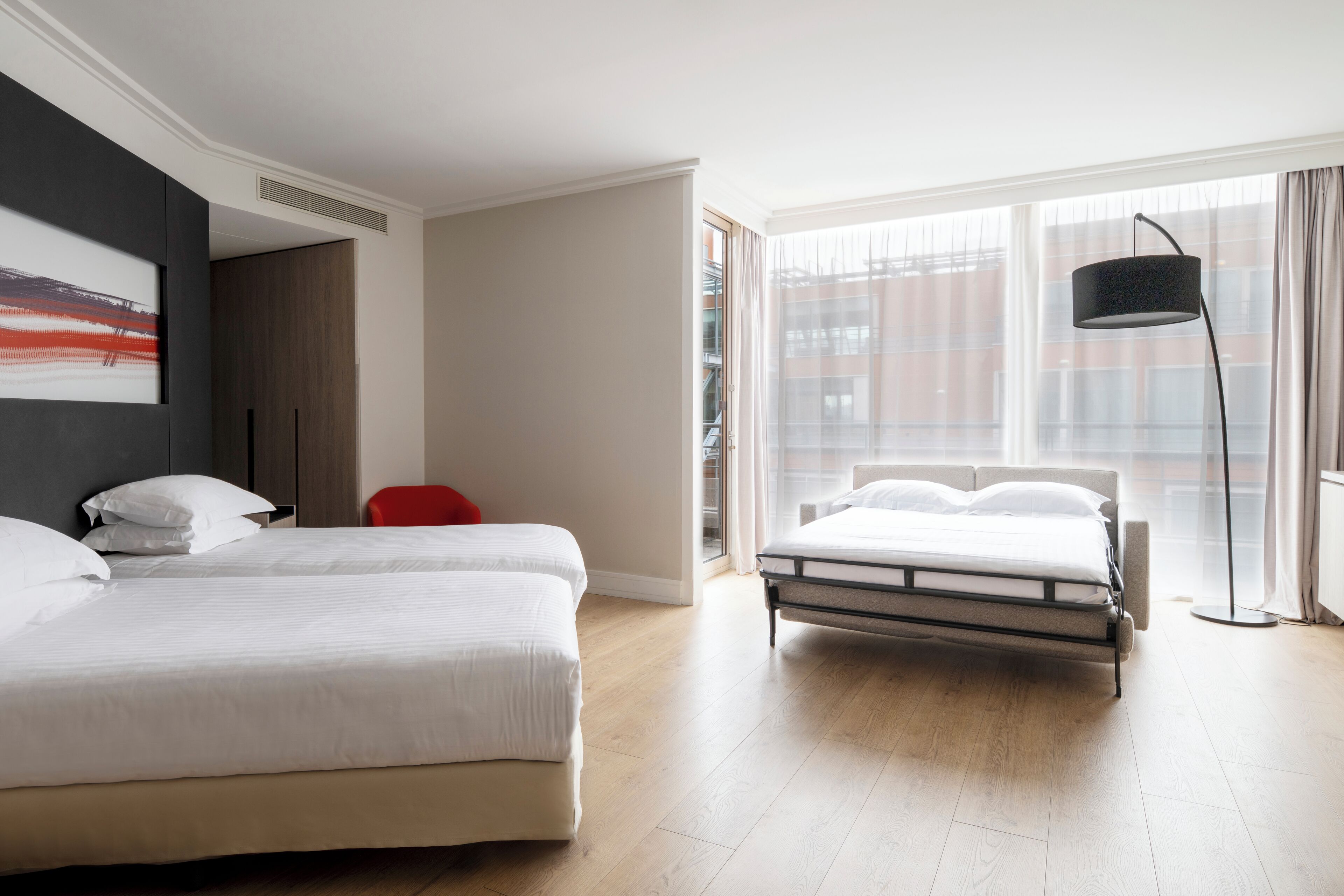 Phòng Suite Junior | Minibar, két bảo mật tại phòng, bàn, phòng cách âm 