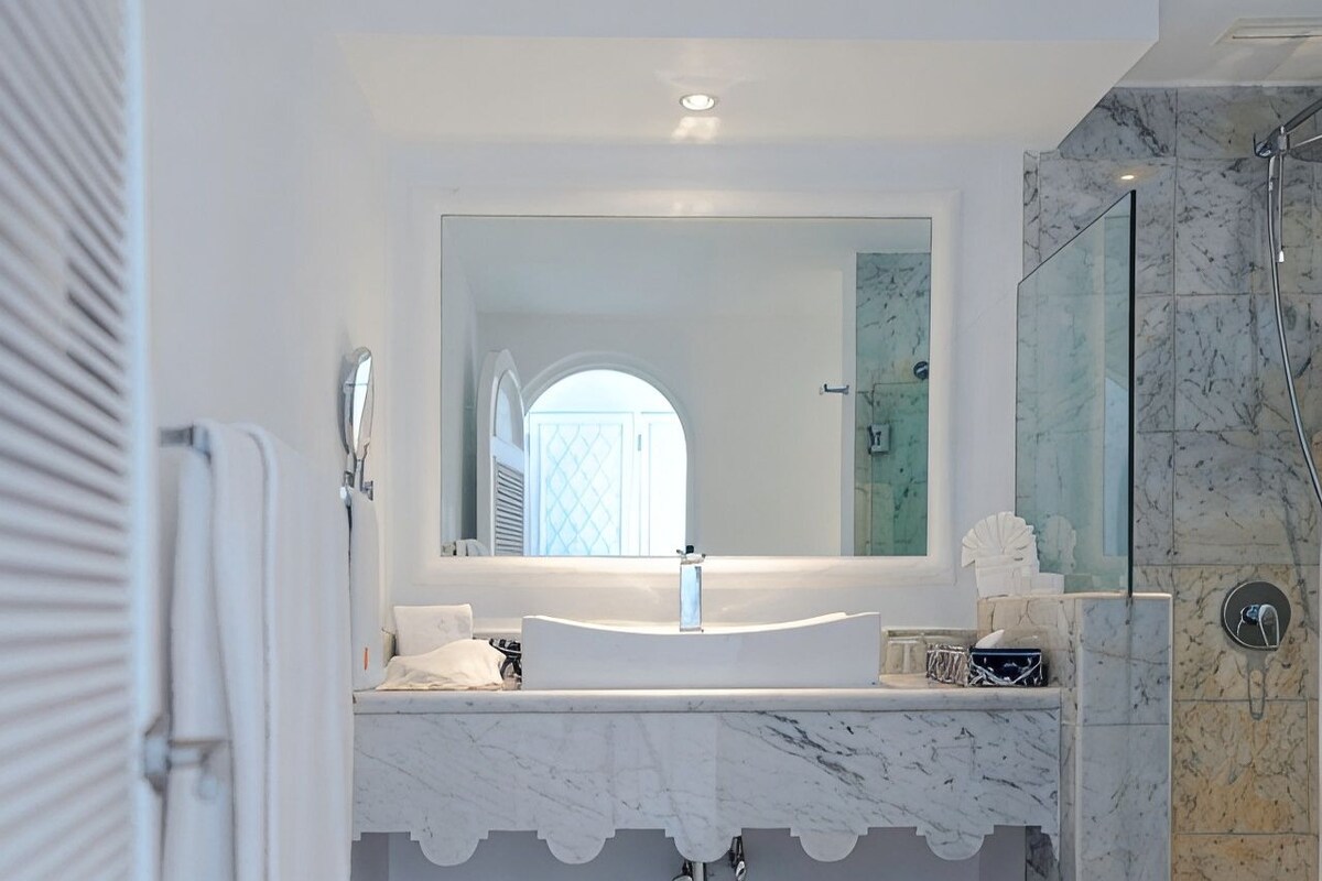 Bathroom | Shower, hair dryer, towels