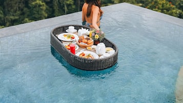 Outdoor pool, pool umbrellas, pool loungers