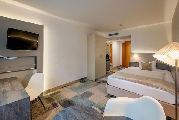 Hypo-allergenic bedding, pillow-top beds, minibar, in-room safe