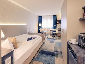 Hypo-allergenic bedding, pillow-top beds, minibar, in-room safe