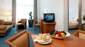 Privilege, Suite, 1 King Bed | Living area | Flat-screen TV
