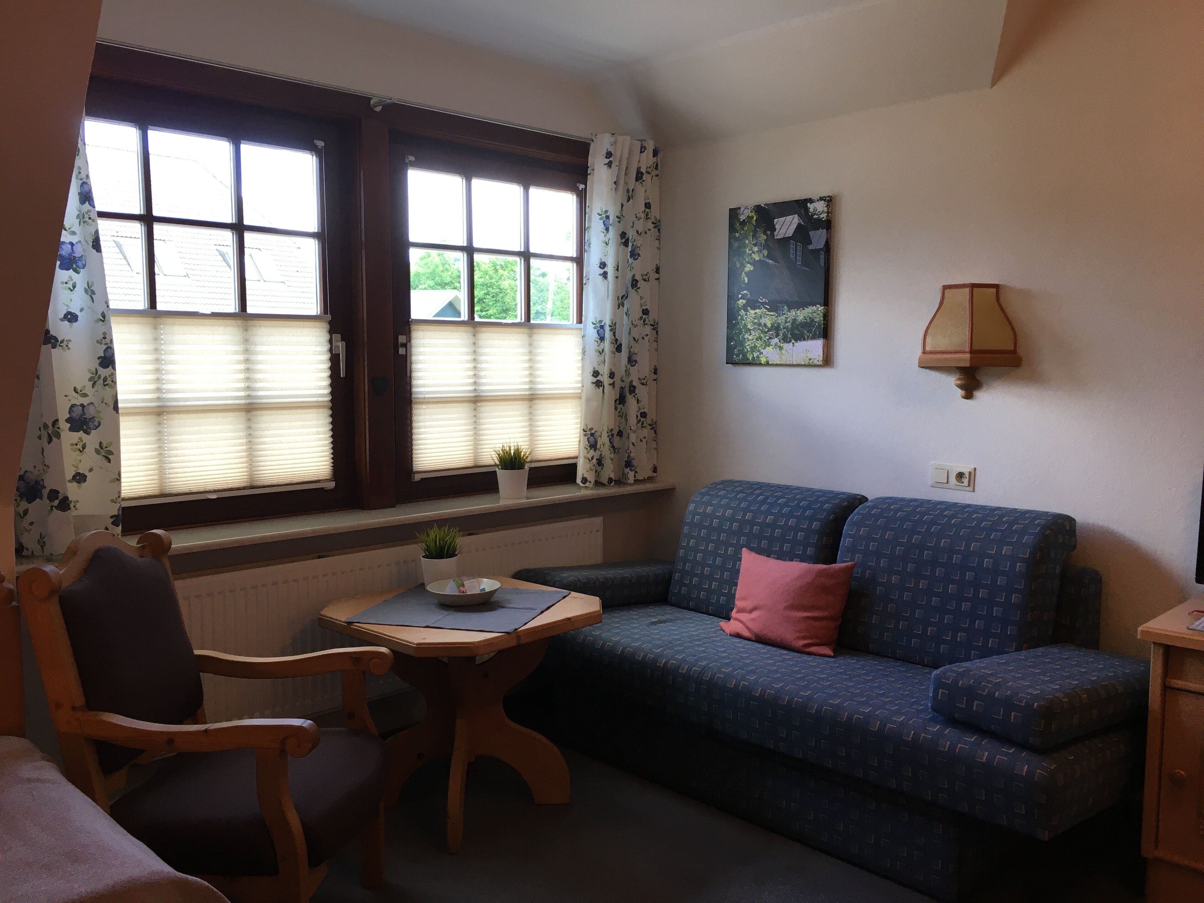 standard double room | living area | flat-screen tv