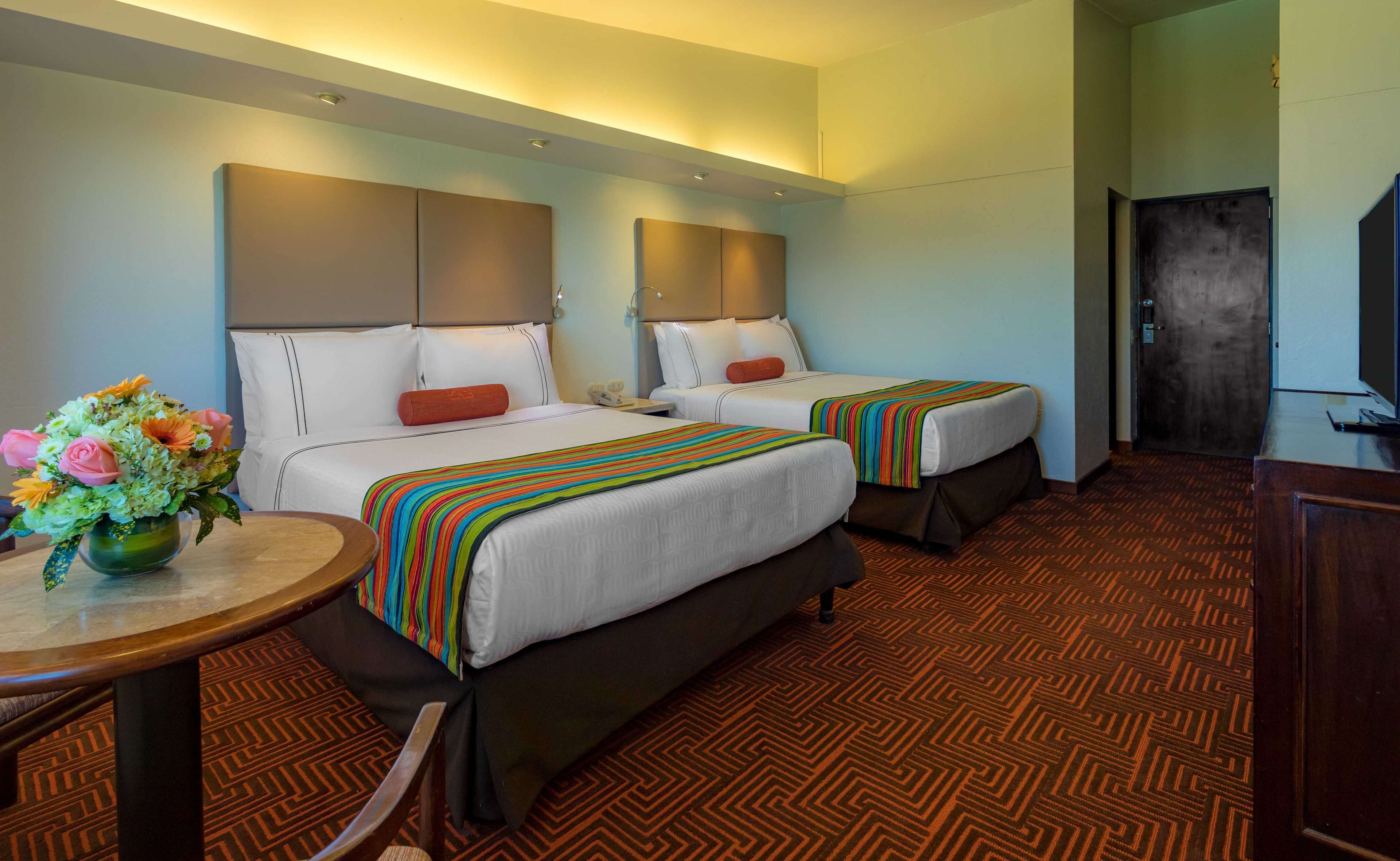 twin room, mountain view | 1 bedroom, down duvets, minibar, in-room safe