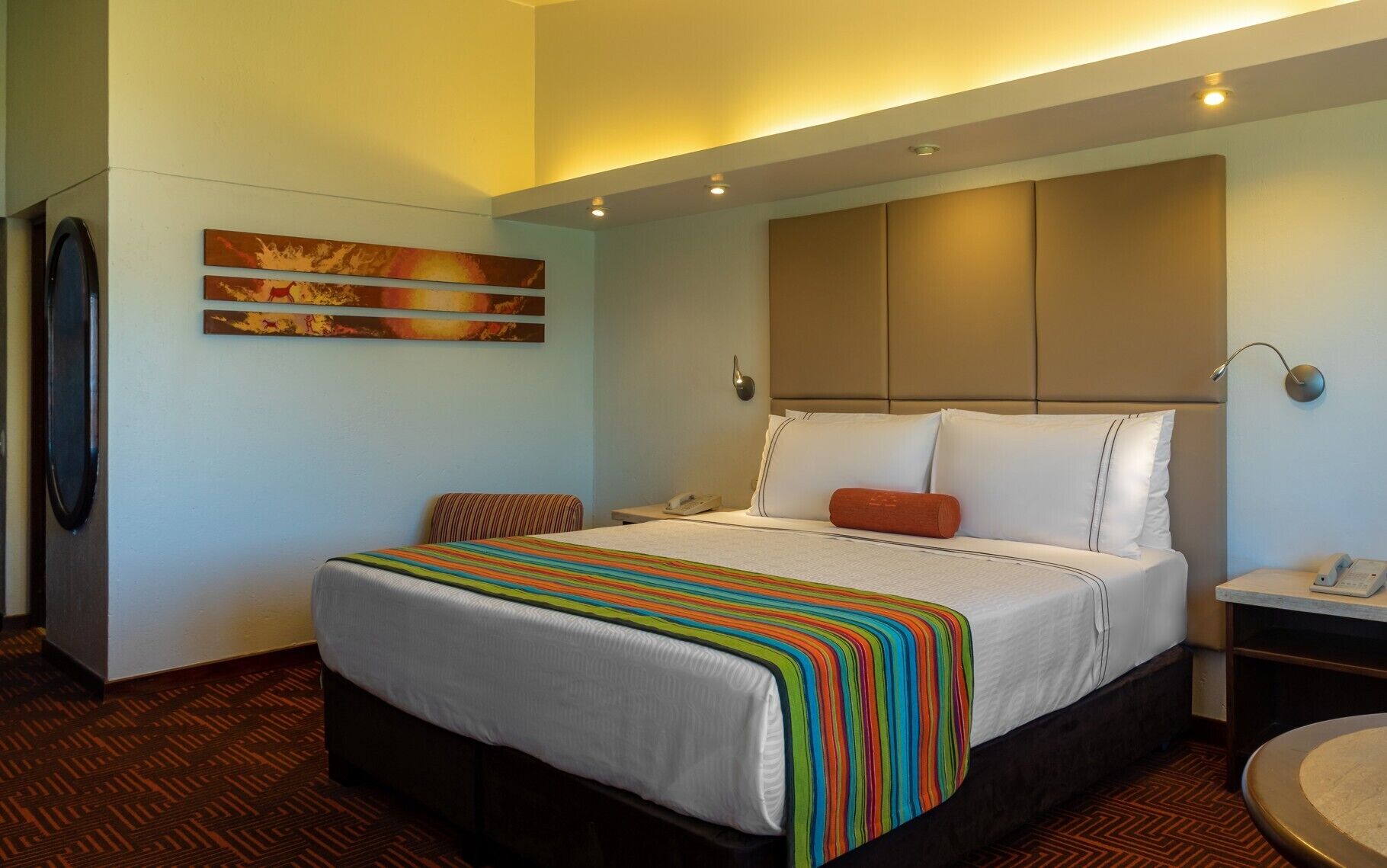 Premium bedding, down comforters, minibar, in-room safe