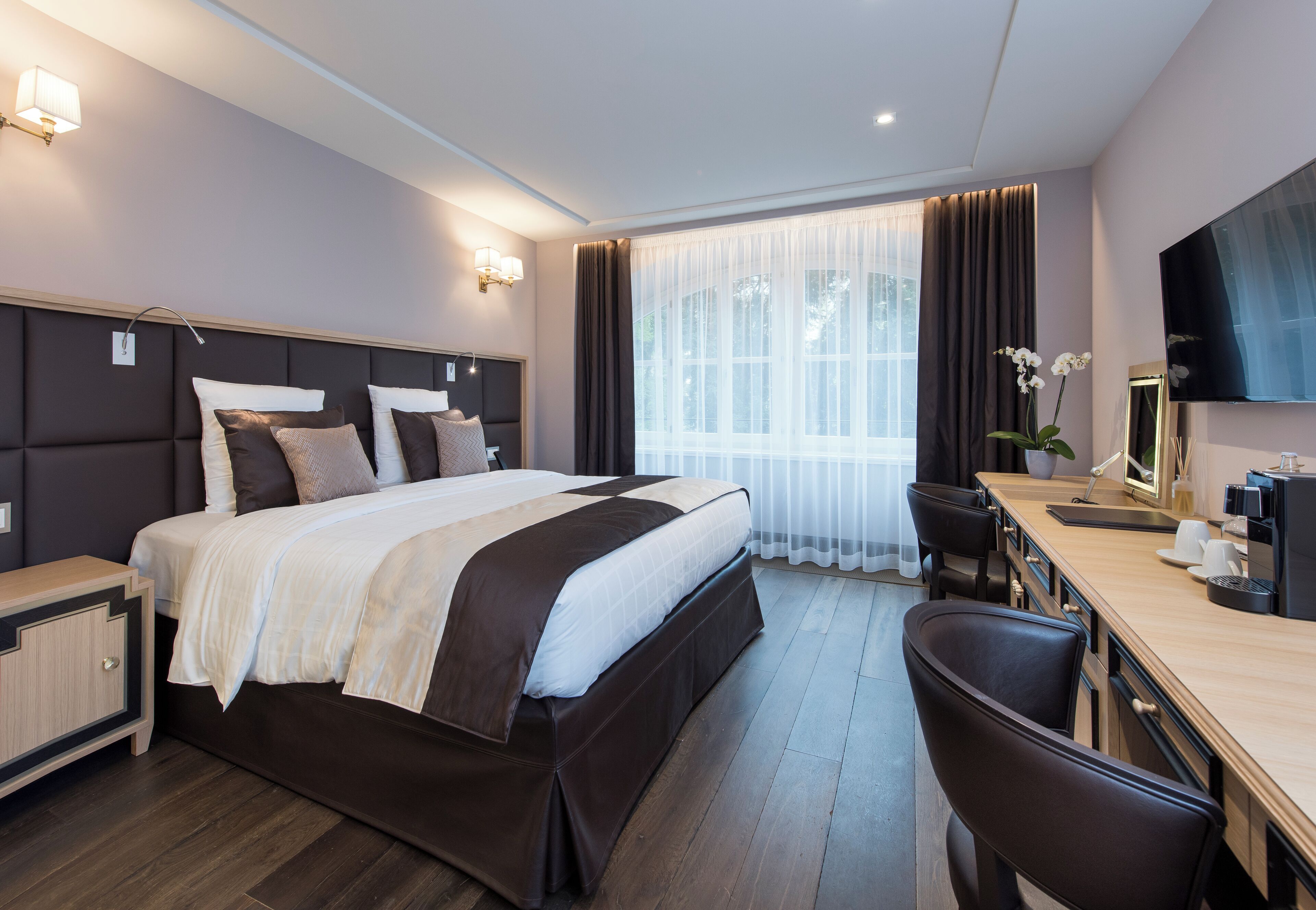 elegance room | 1 bedroom, minibar, in-room safe, individually decorated