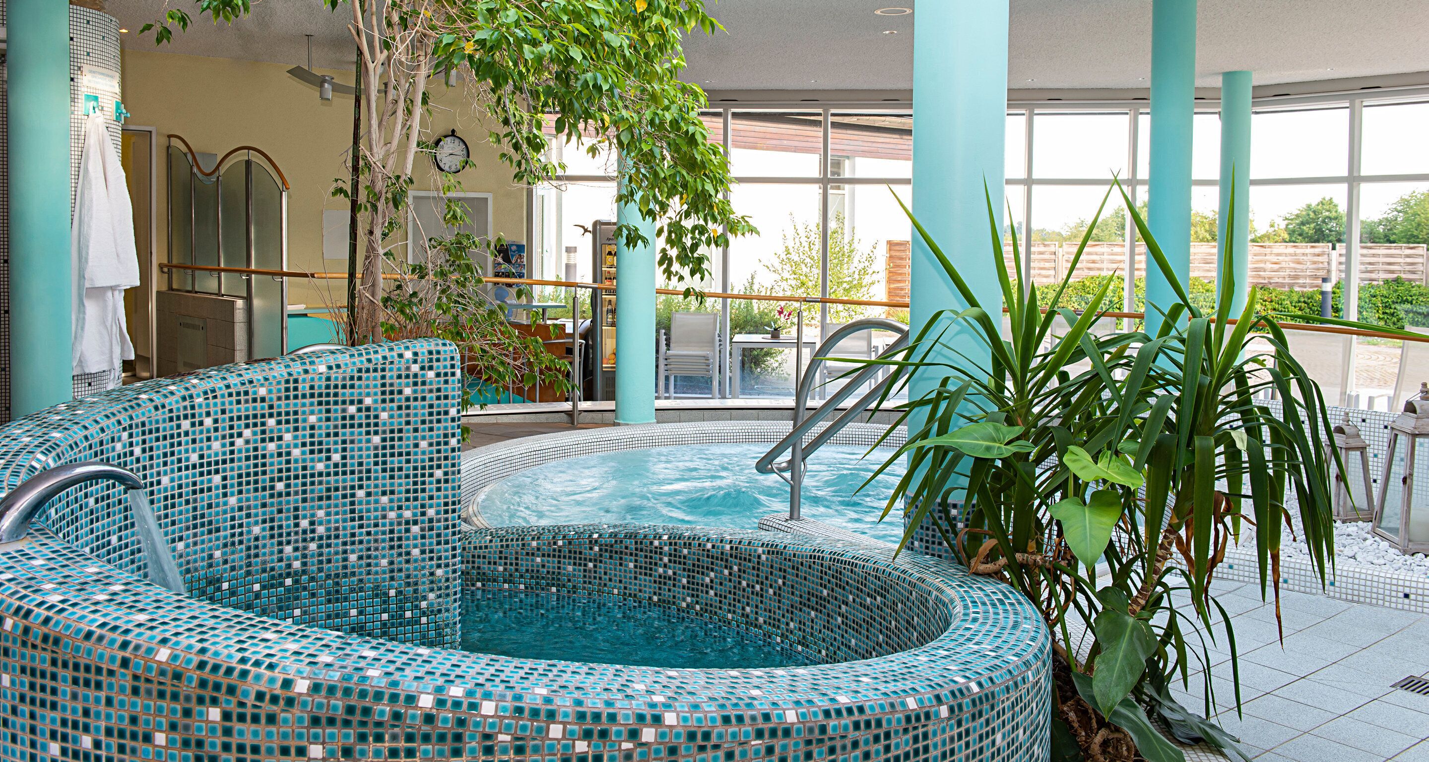 indoor pool, outdoor pool, open 8:00 am to 9:00 pm, pool loungers