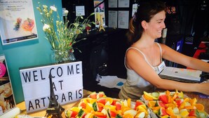 A welcome sign at a Parisian venue with a fruit display in the foreground. - Arty Paris Porte de Versailles by River - Hostel (Paris)