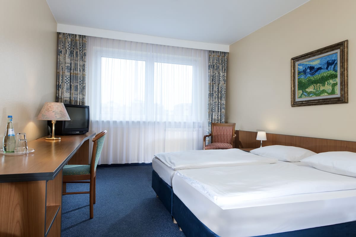 Desk, cribs (free), rollaway beds (surcharge), WiFi (free)