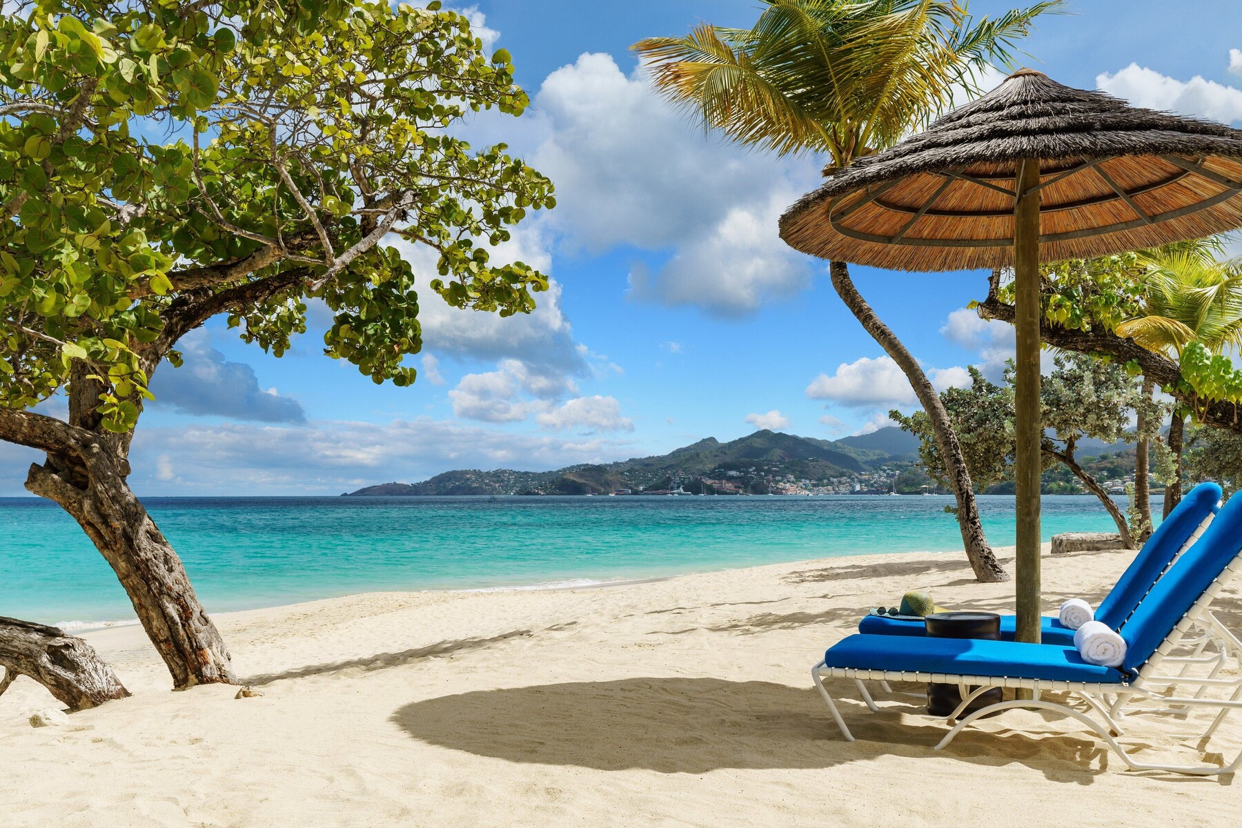 Beach nearby, white sand, sun loungers, beach umbrellas