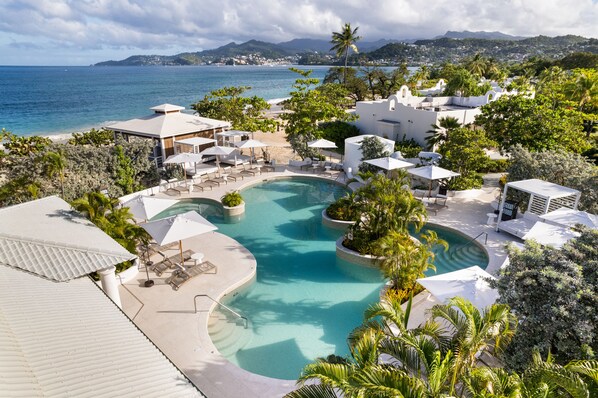 Outdoor pool, free pool cabanas, pool umbrellas