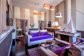 Panoramic Ambassador Apartment | Living area | 40-inch LCD TV with digital channels