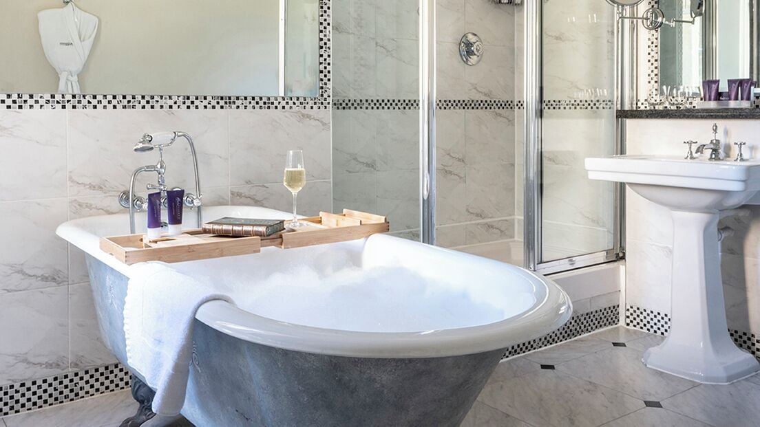 superior double / twin with feature | bathroom | designer toiletries, hair dryer, bathrobes, slippers