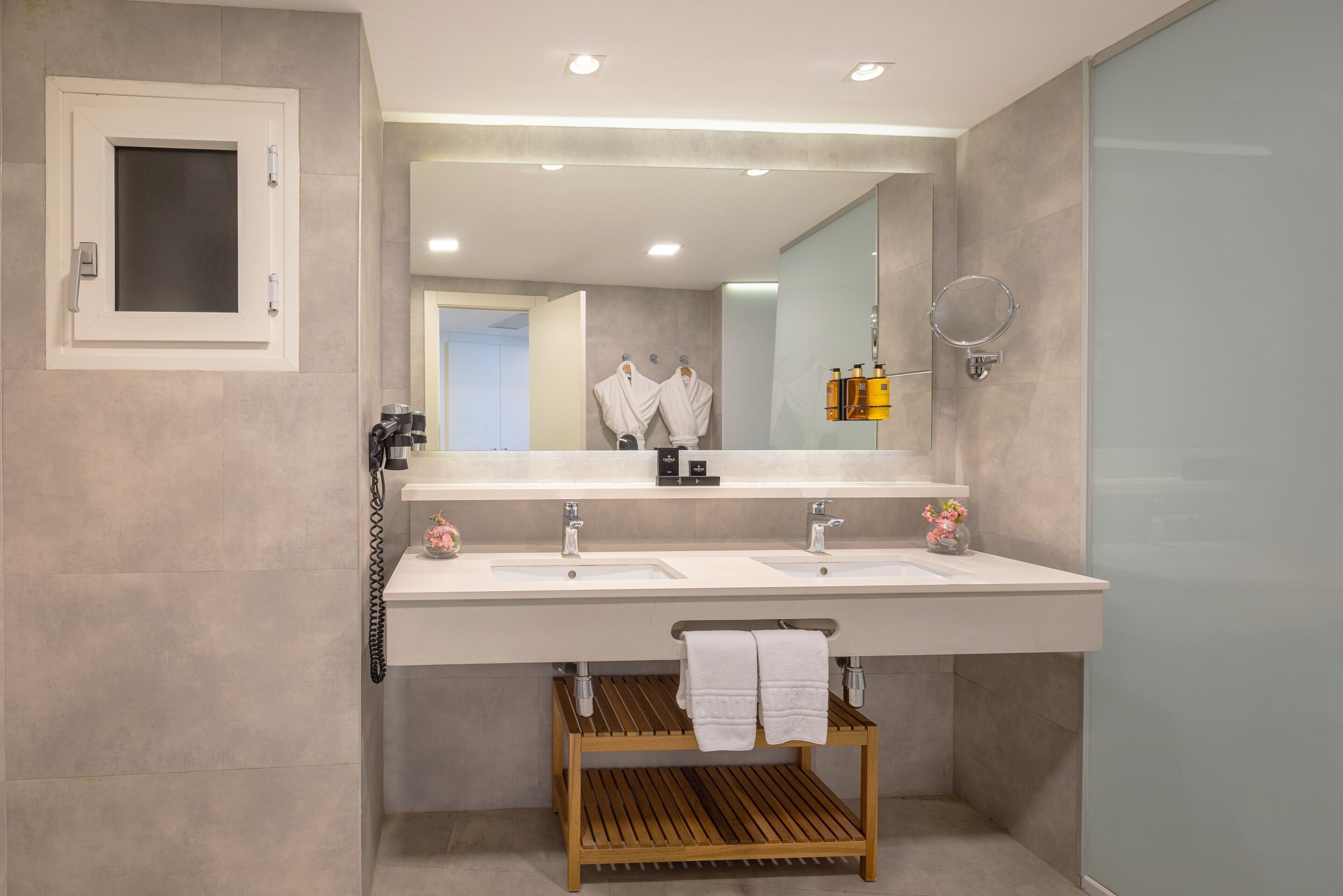 shower, eco-friendly toiletries, hair dryer, slippers