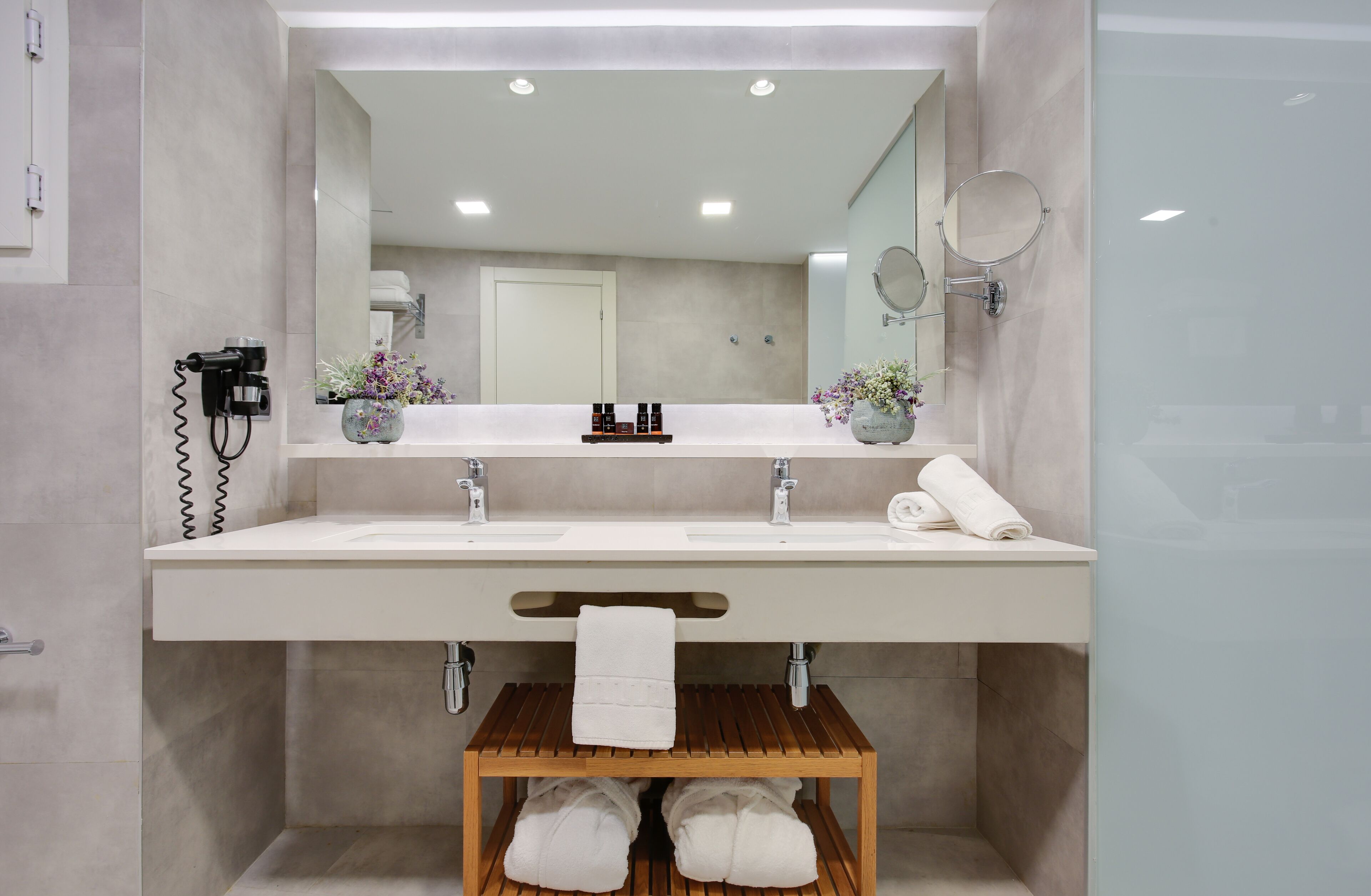 shower, eco-friendly toiletries, hair dryer, slippers