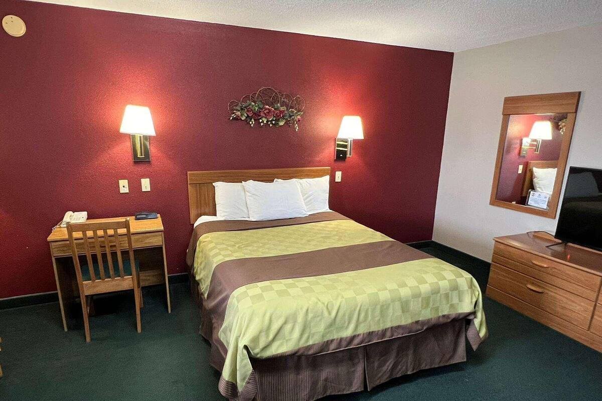 Desk, blackout drapes, cribs (free), WiFi (free)