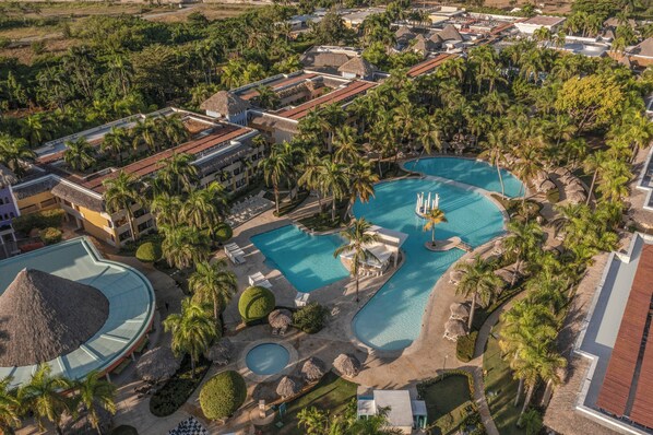 Outdoor pool, open 7 AM to 7 PM, pool umbrellas, pool loungers