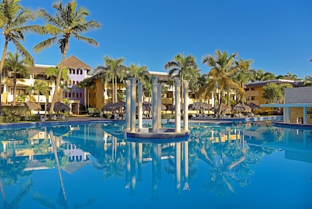 Outdoor pool, open 7 AM to 7 PM, pool umbrellas, sun loungers