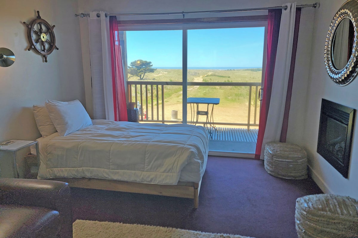 Condo, Balcony, Ocean View (2nd Floor, Dog Friendly) | Living area | 43-inch flat-screen TV with cable channels, books, video library