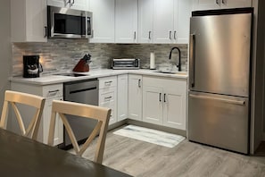Deluxe Condo, Balcony, Ocean View (3rd Floor) | Private kitchen | Fridge, microwave, coffee/tea maker, cookware/dishes/utensils - Chautauqua Resort & Conference Center (Long Beach)