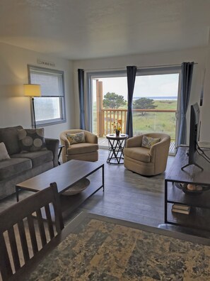 Deluxe Condo, Balcony, Ocean View (3rd Floor) | Desk, laptop workspace, blackout drapes, free WiFi