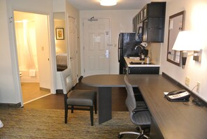 Desk, laptop workspace, blackout curtains, iron/ironing board