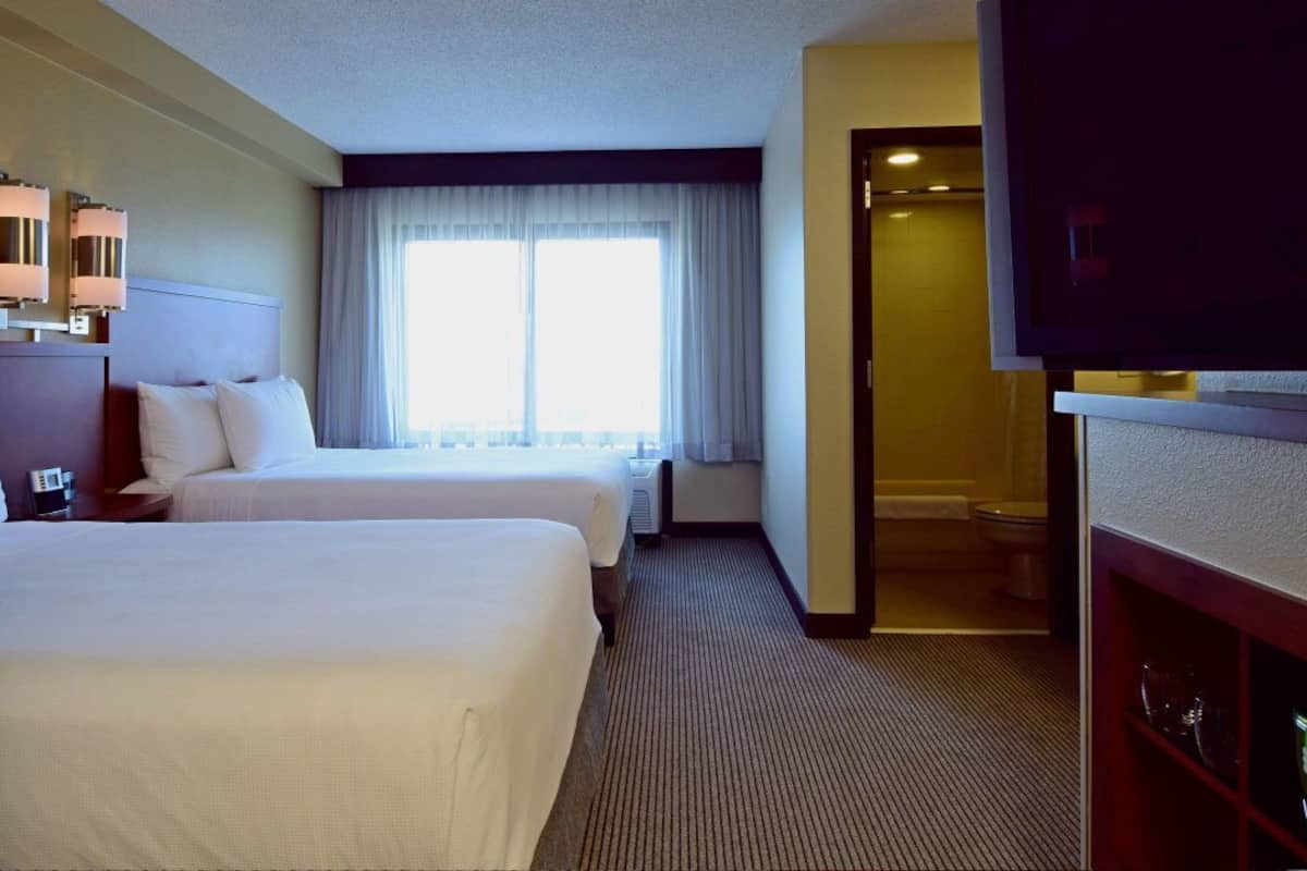 Premium bedding, down comforters, desk, laptop workspace
