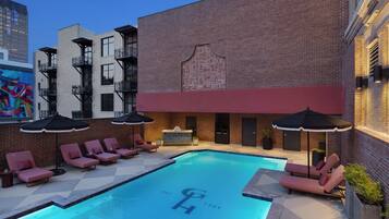 Outdoor pool, open 5:00 AM to 10:00 PM, pool loungers