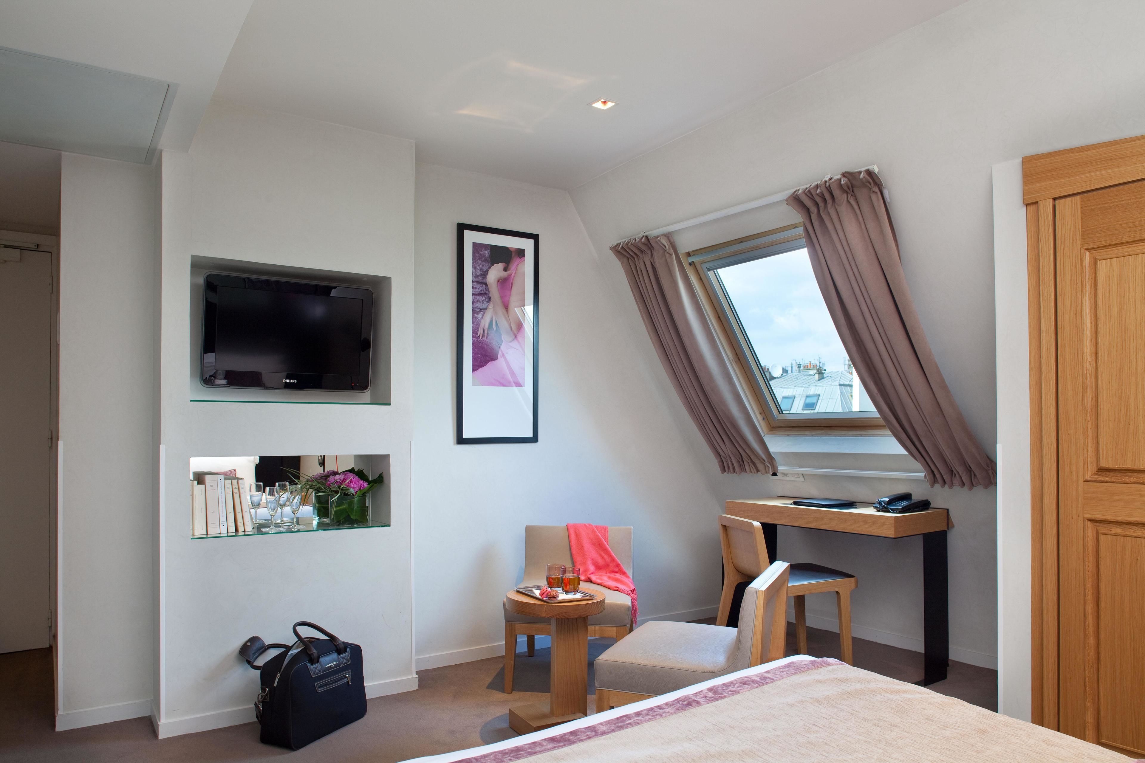 deluxe double room | premium bedding, minibar, in-room safe, desk