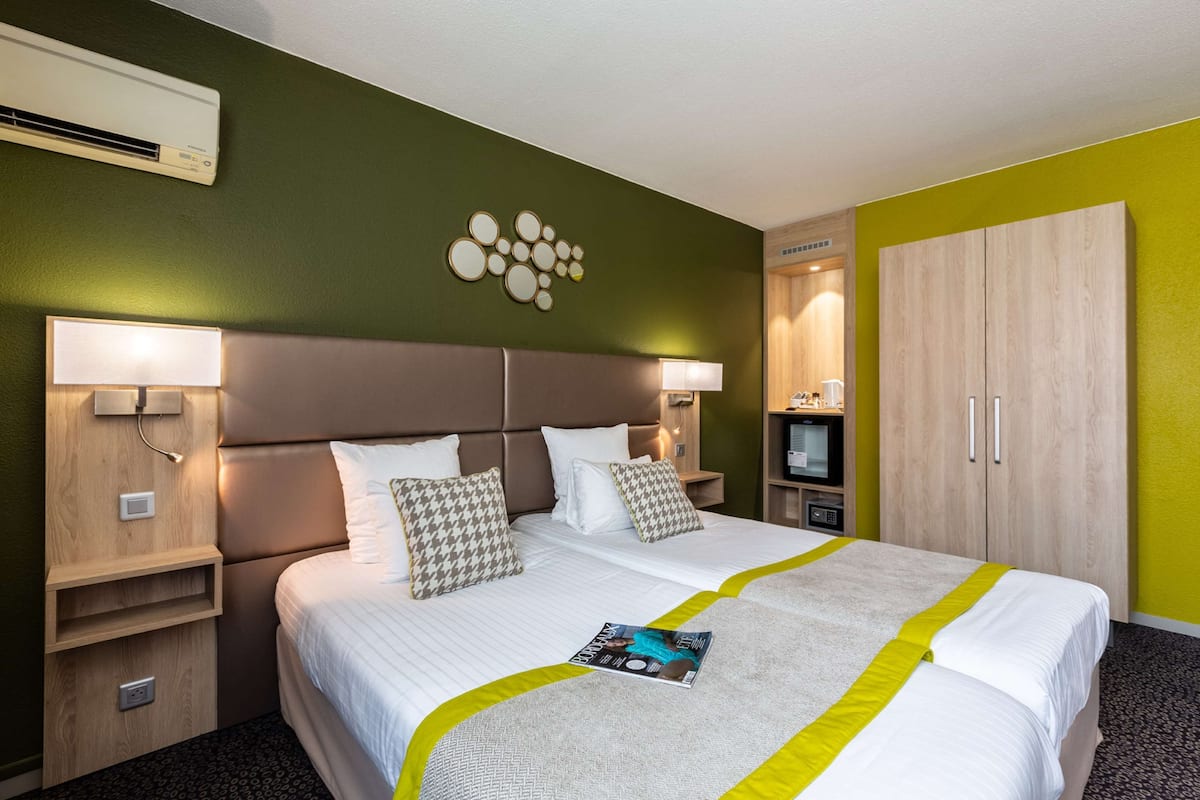 individually decorated, individually furnished, desk, blackout curtains