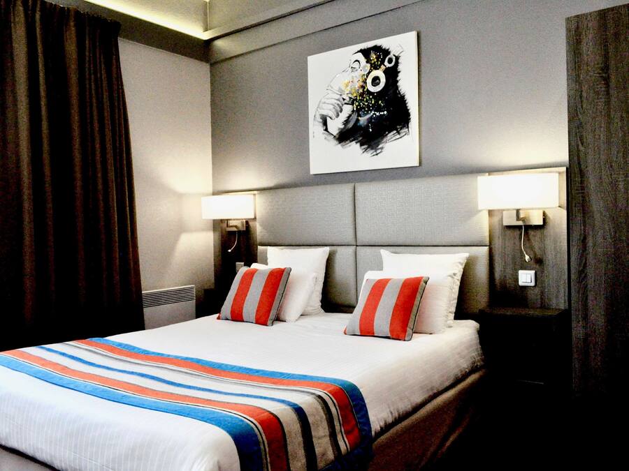 Standard Room, Multiple Beds | Individually decorated, individually furnished, desk, blackout drapes