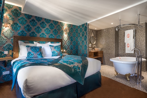 Luxe beddengoed, pillowtop-bedden, een kluis op de kamer