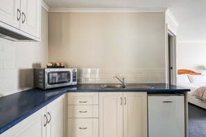 Fridge, microwave, coffee/tea maker, electric kettle