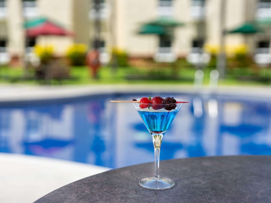 Outdoor pool, pool umbrellas, sun loungers
