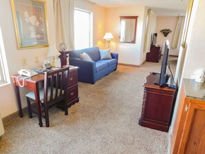 Superior Suite, 1 King Bed, Non Smoking | Living room | 32-inch flat-screen TV with cable channels, TV