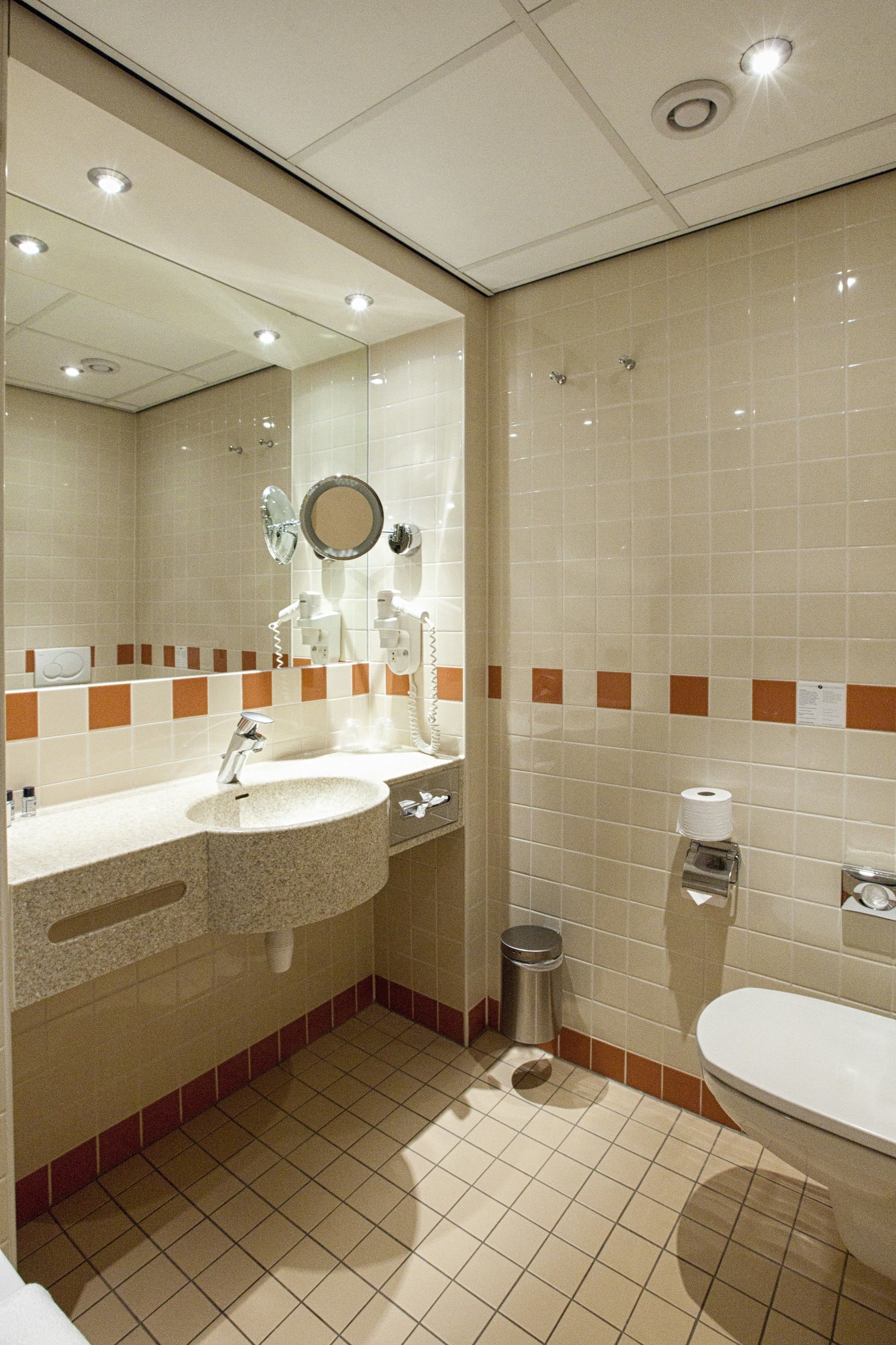 eco-friendly toiletries, hair dryer, towels