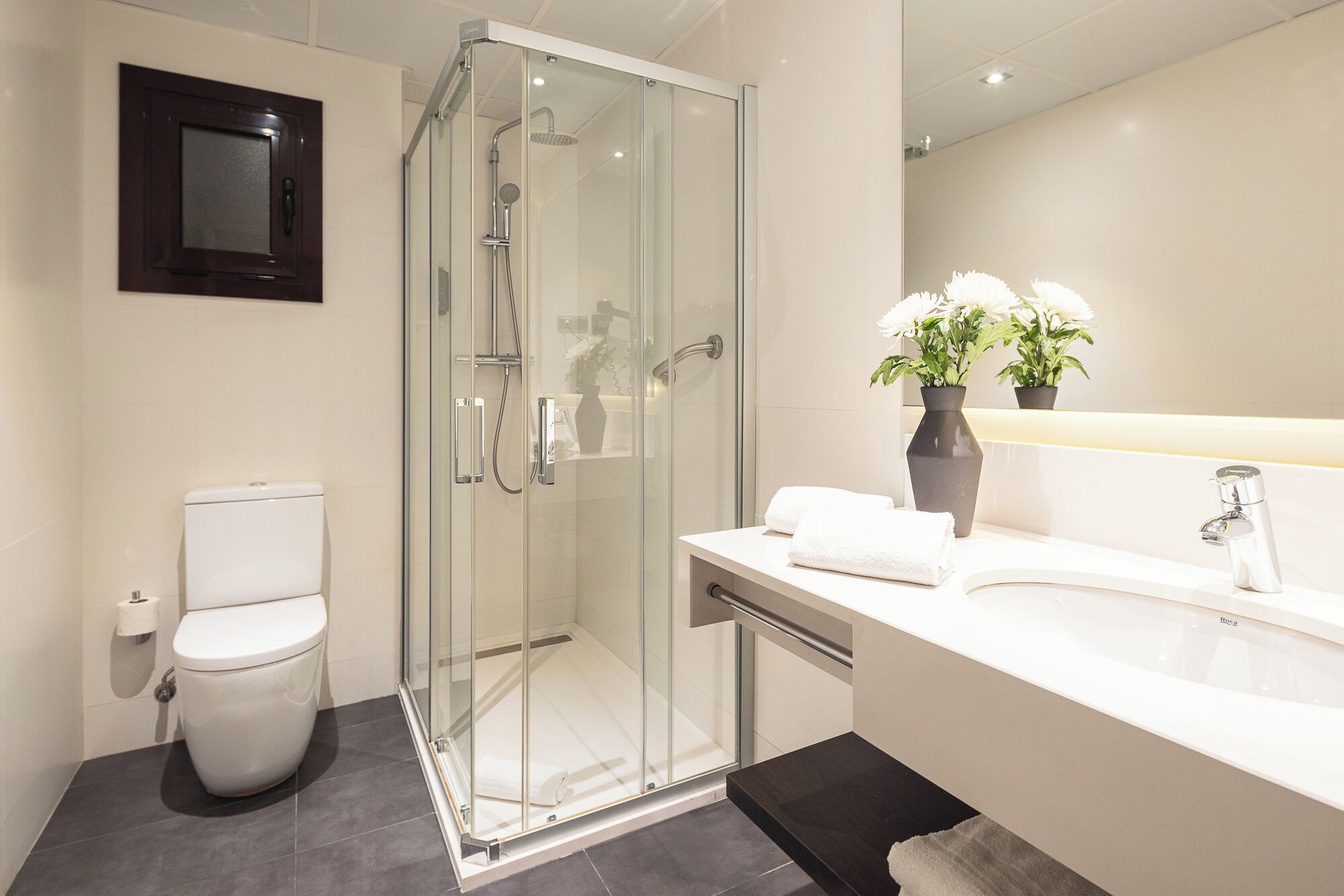 deep-soaking bathtub, eco-friendly toiletries, hair dryer, towels