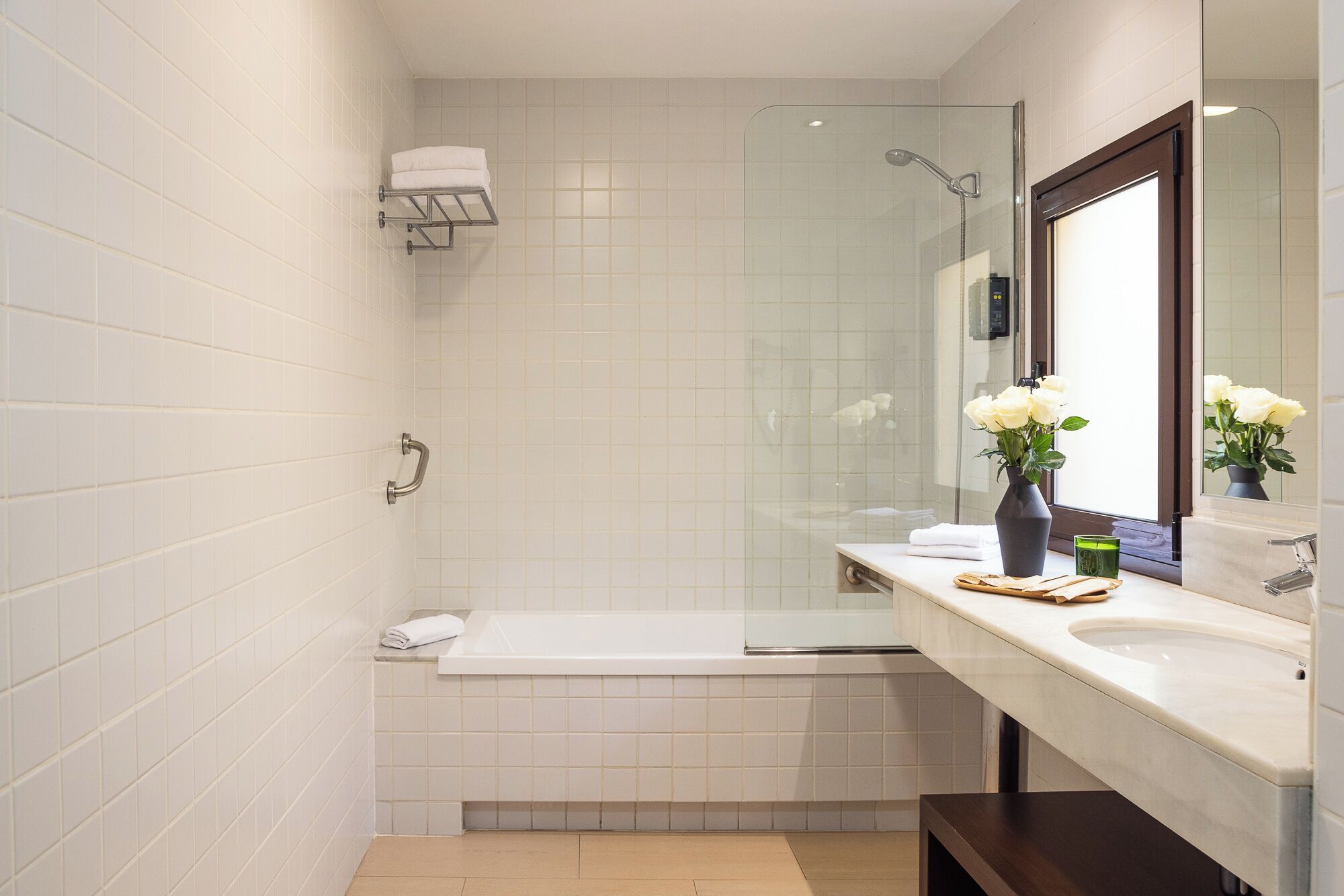 junior suite | bathroom | deep-soaking bathtub, eco-friendly toiletries, hair dryer, towels