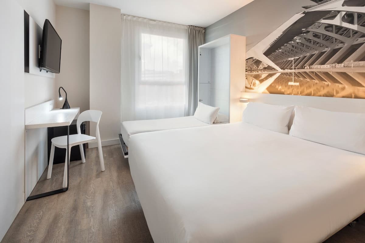 Family Triple Room | Premium bedding, in-room safe, desk, free WiFi