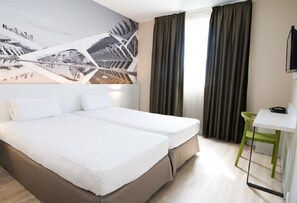 Premium bedding, in-room safe, WiFi