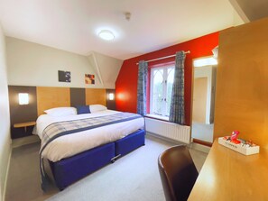 Standard Double Room | Minibar, blackout curtains, iron/ironing board, free WiFi