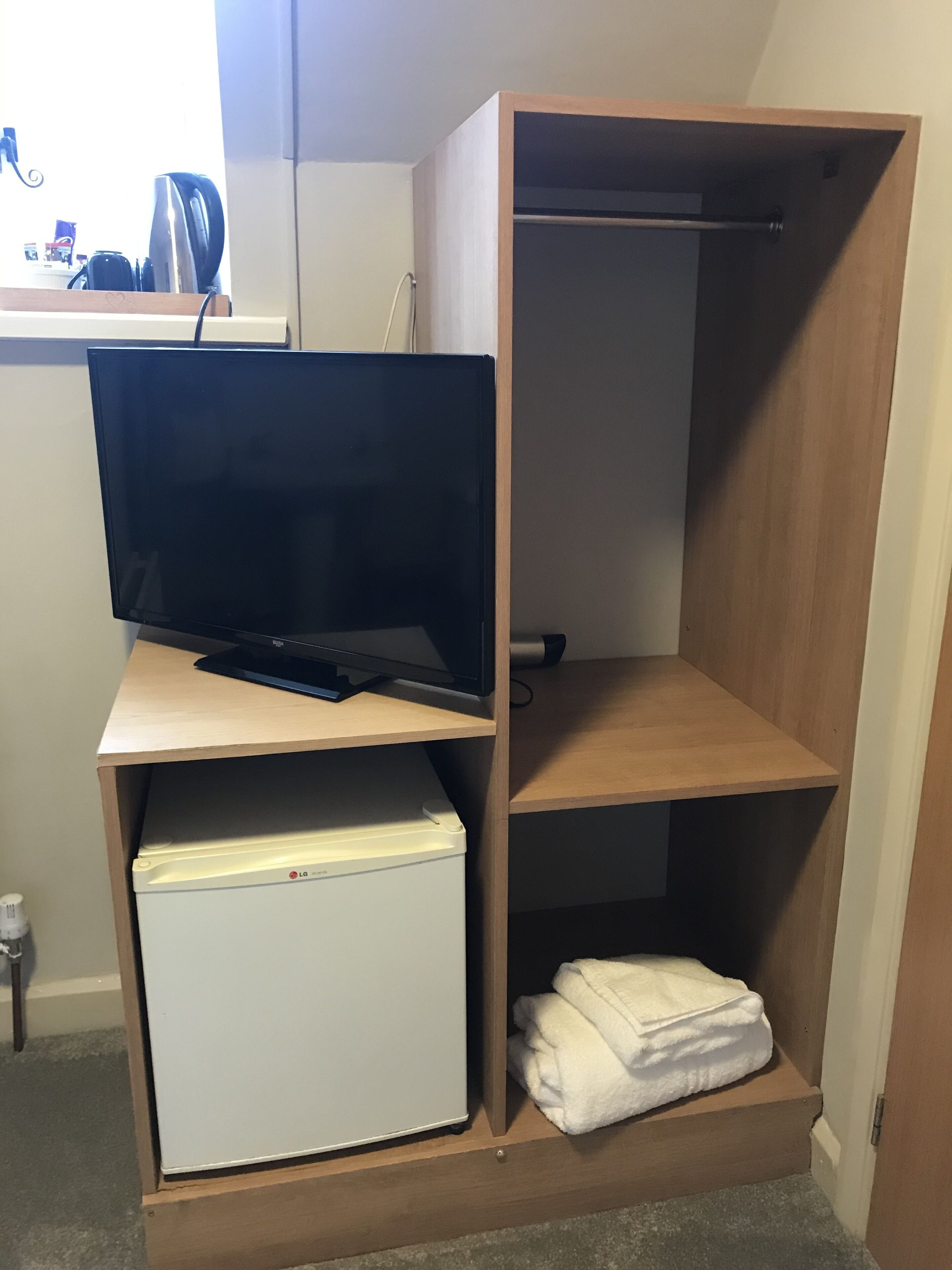 economy single room | minibar, blackout curtains, iron/ironing board, free wifi