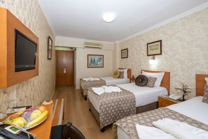 Triple Room | Minibar, in-room safe, rollaway beds, free WiFi