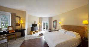 Deluxe Room, 1 King Bed | Premium bedding, minibar, in-room safe, individually decorated