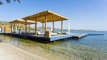 Serviço de traslado de/para a praia grátis, espreguiçadeiras