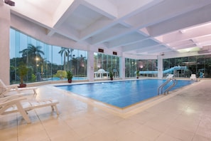 Indoor pool, outdoor pool, pool umbrellas, pool loungers