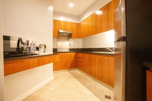 Three-Bedroom Suite | Private kitchen