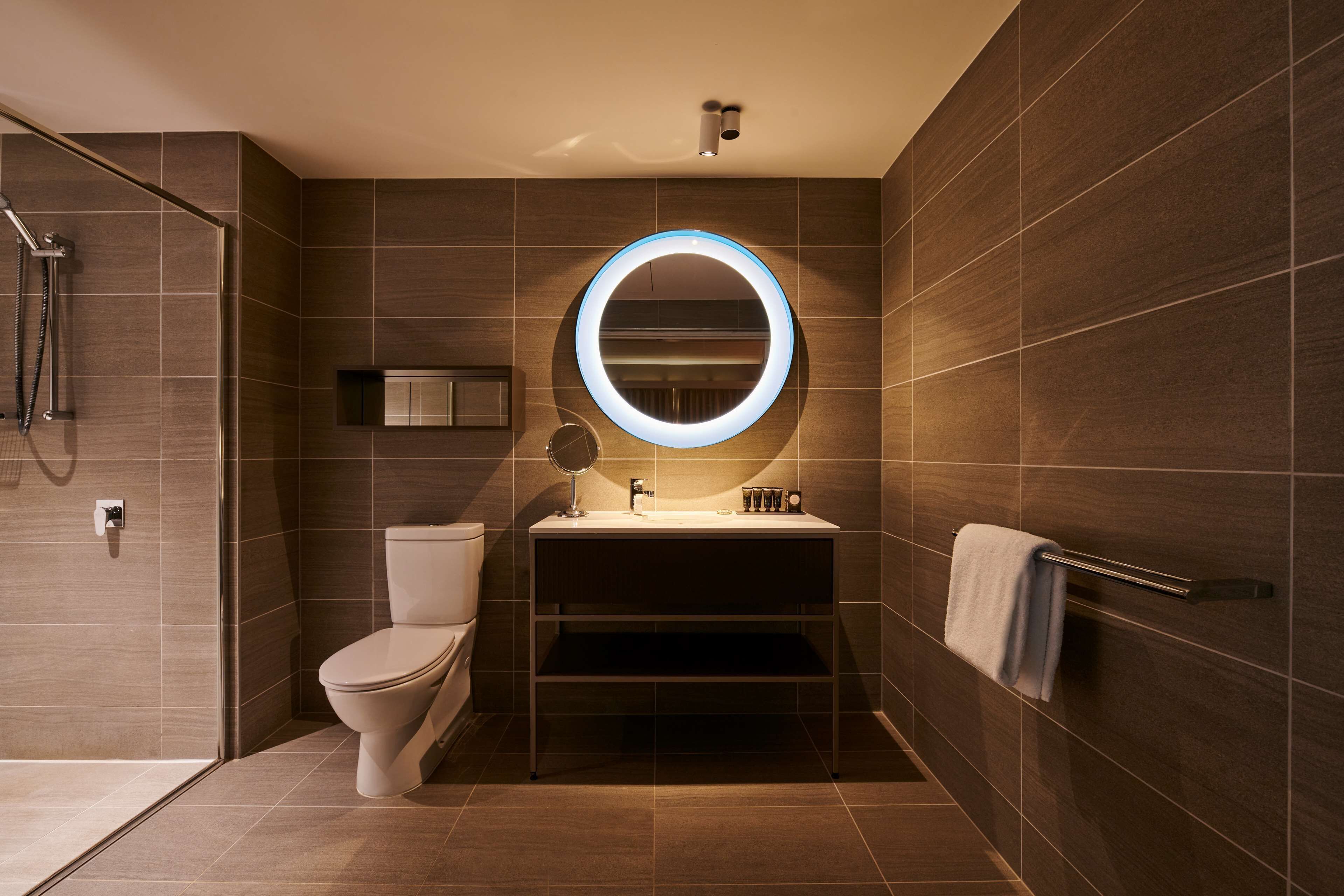 shower, free toiletries, hair dryer, towels