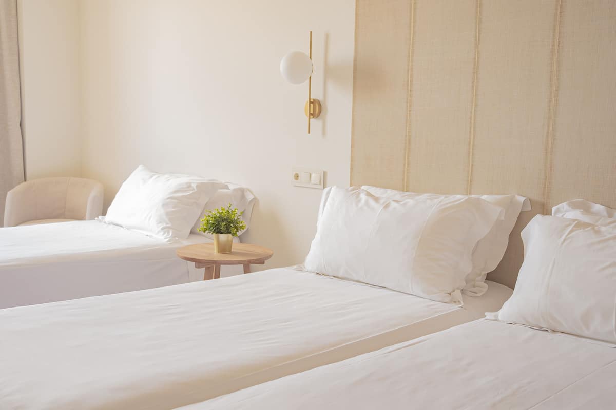 superior triple room | down duvets, minibar, in-room safe, desk